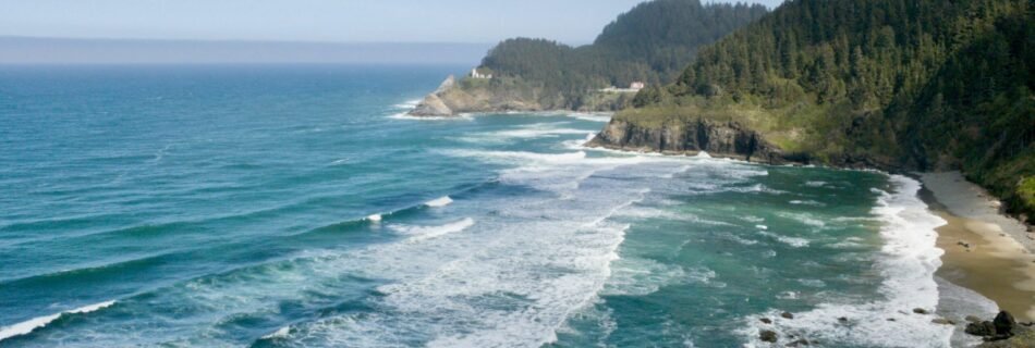 a view of the ocean from the top of a cliff