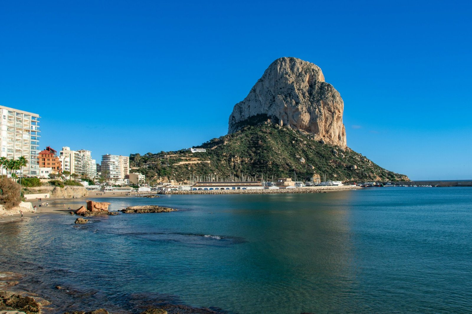 Stunning aerial view of Calpe, Spain, featuring the Peñón de Ifach and Mediterranean coastline.