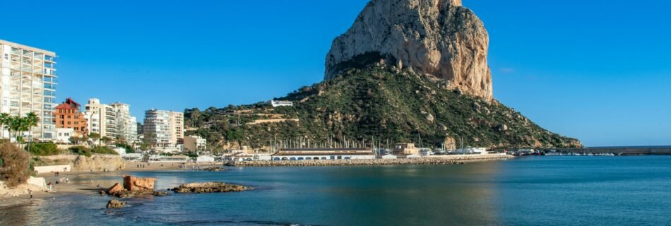 Stunning aerial view of Calpe, Spain, featuring the Peñón de Ifach and Mediterranean coastline.