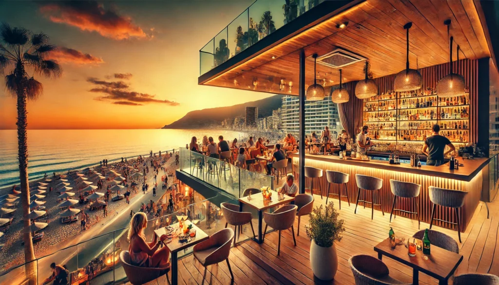 "Horizontal image of beachfront bars and lounges illustrating calpe costa blanca nightlife with people enjoying cocktails and ocean views."
